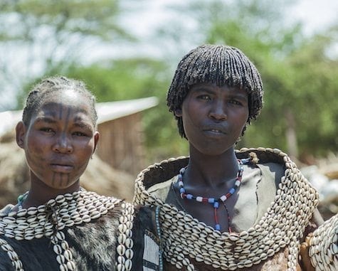 WEITA. OMO VALLEY. ETHIOPIA - DECEMBER 29, 2013: Traditionally dressed unidentified women from Tsemay tribe. Most Omo Valley people maintain their traditional way of life.